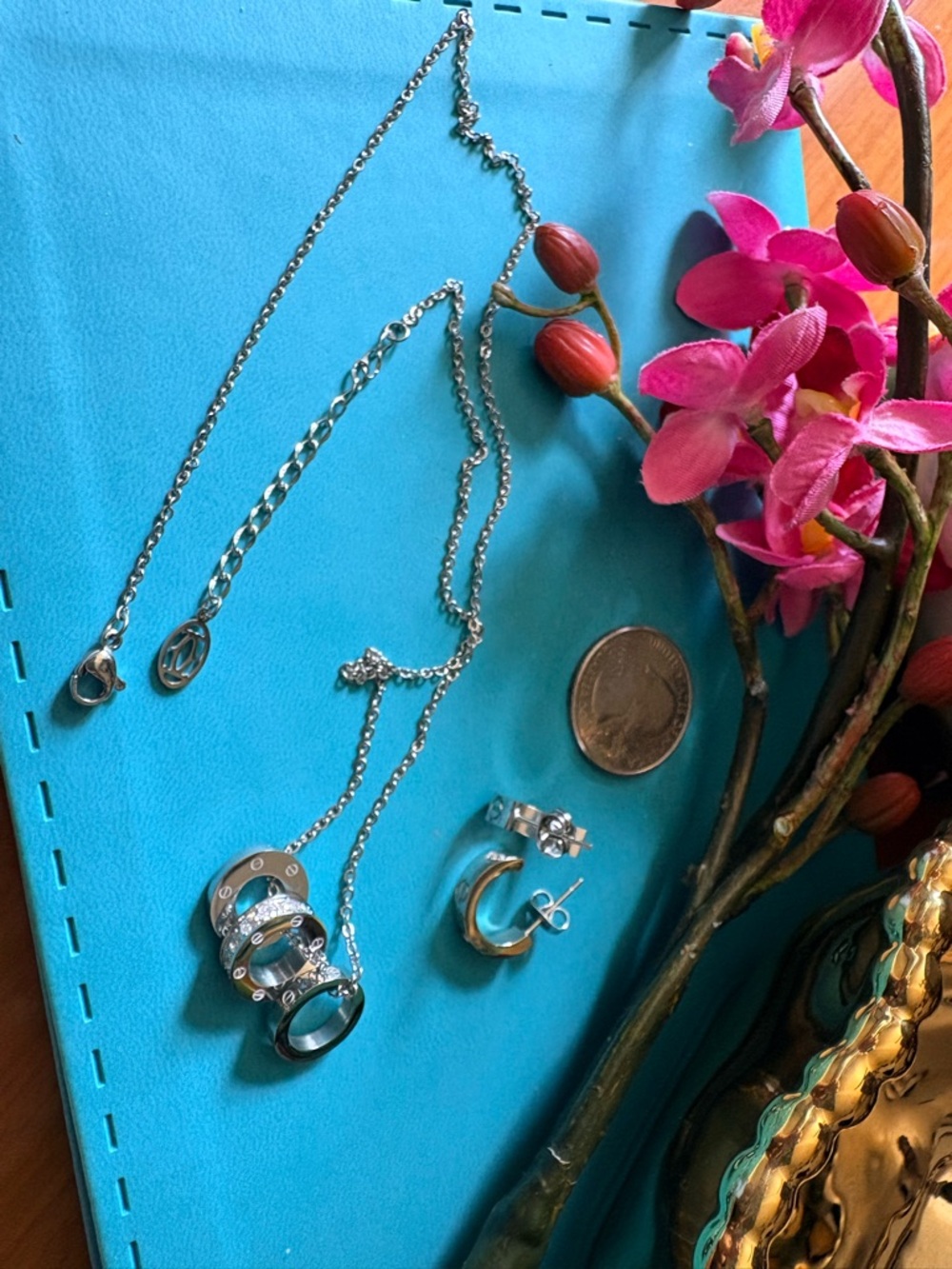Earrings and a necklace with chain